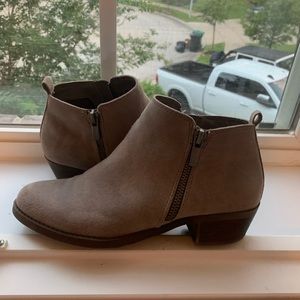 Cute brown ankle boot with zippers on both sides.